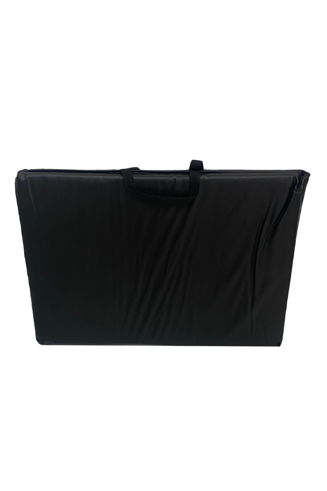 Black exercise mat folded in half