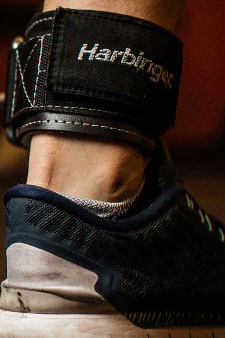 Male ankle wearing ankle cuff cable attahment