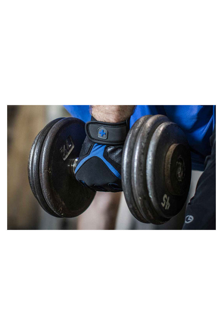 man wearing Harbinger Training Grip Gloves holding dumbbell