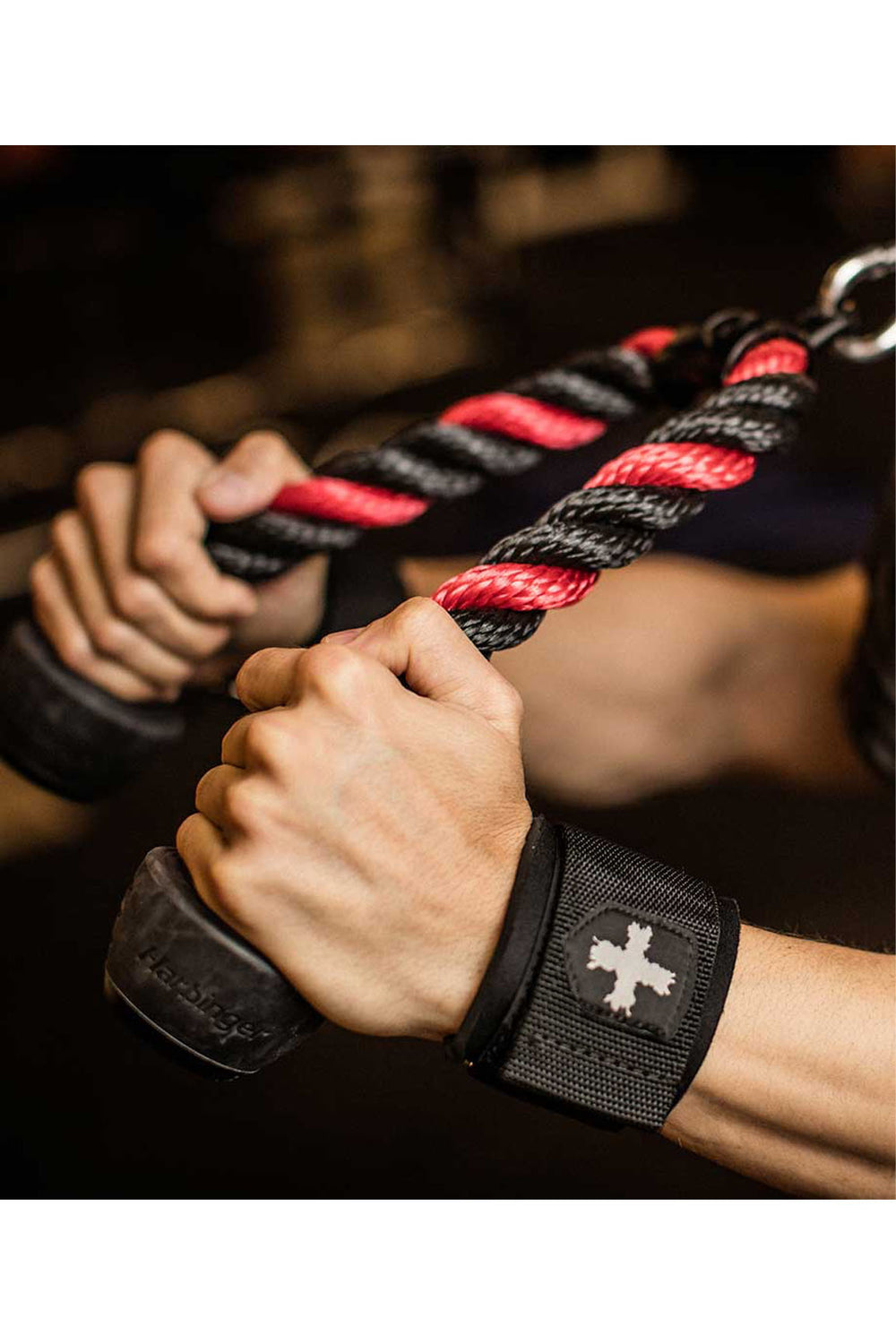 Man pulling the Harbinger Tricep Rope